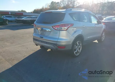 2014 Ford Escape Titanium z USA, uszkodzony, nr VIN 1FMCU0J99EUB40185